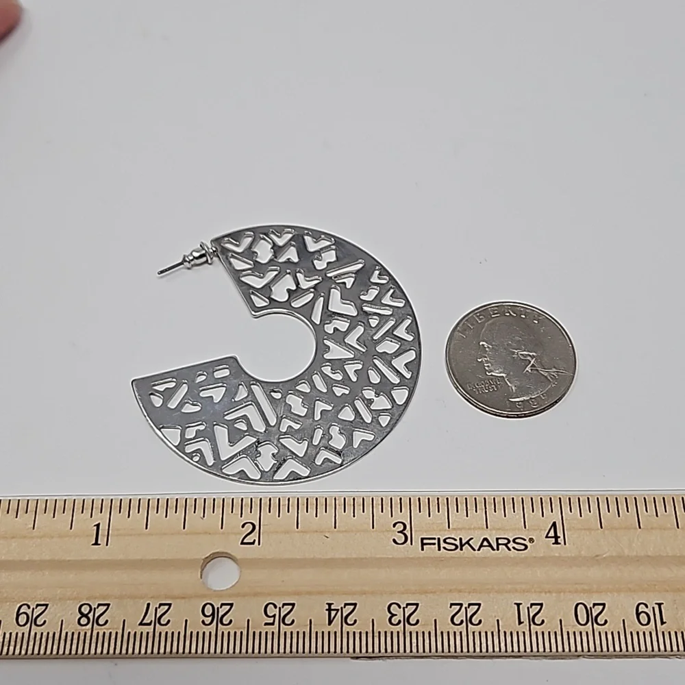 Silver Tone Hoop Style Earrings